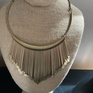 Women’s brushed gold statement necklace